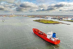 Tanker ship entering the port of IJmuiden seen from above.