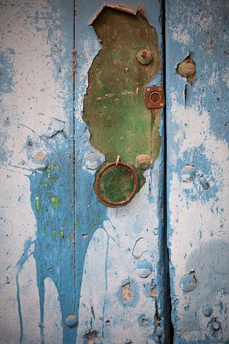 Close up of an old weathered door by Sandra Hogenes