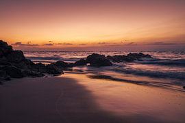 A quiet beach at sunrise by Harald Bader Photography