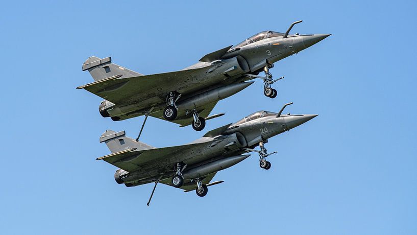 Two French Rafale Marine fighter aircraft. by Jaap van den Berg