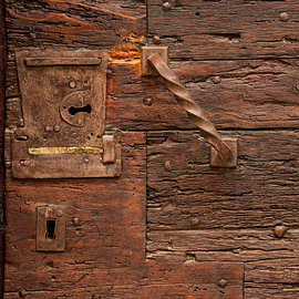 Locks on an old door by Halma Fotografie