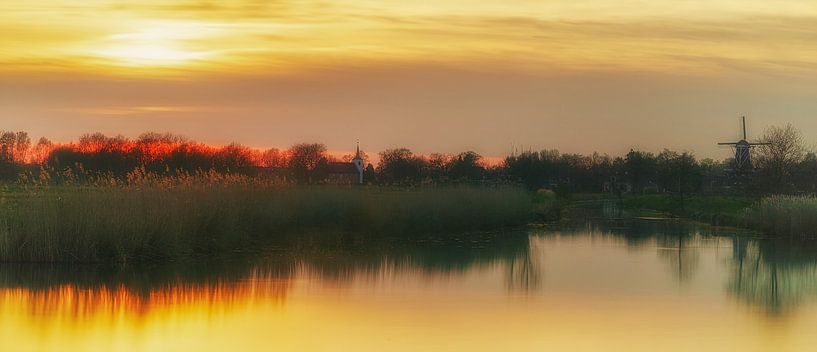 Molen en Kerk Roderwolde Drenthe zonsondergang  van R Smallenbroek