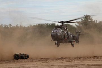 Cougar helicopter deploys to pick up soldiers by Mariska Bruin