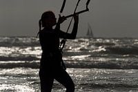 Kitesurfing during sunset