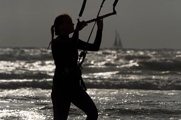 Kitesurfing during sunset by Liesbeth Vogelzang