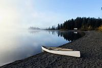 Canoe on the edge of the lake