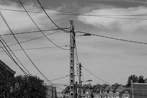 Electric wires in a small French harbour, in black and white