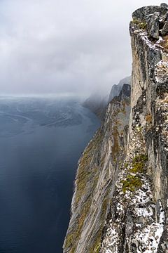 The steep cliff of Segla which is over 600 meters above sea level by Jasper den Boer