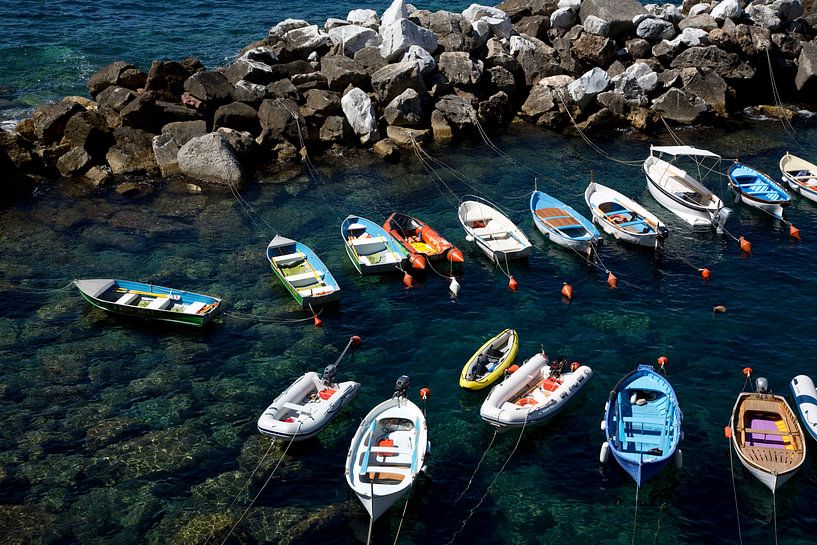 Boats floating on the water by Yvs Doh