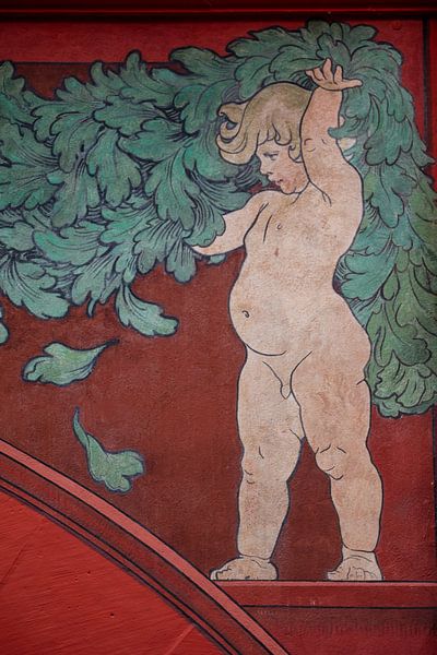 Fresco with child on Council House of Basel in Switzerland by Joost Adriaanse