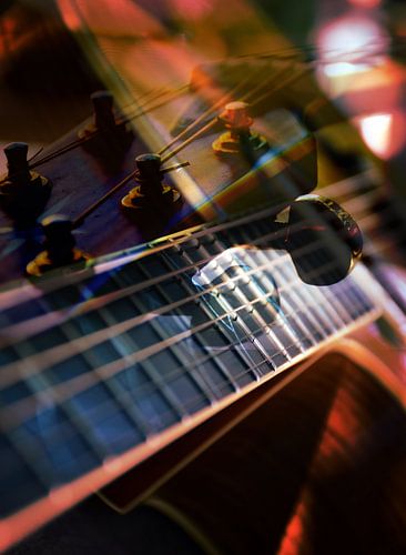 Guitar - abstract double exposure of strings and pegs of the musical instrument