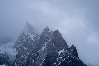 France - Chamonix - Mont Blanc rocky peak - Snowy mountains around Ch