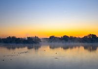 Sonnenaufgang und ein tief hängender Nebel