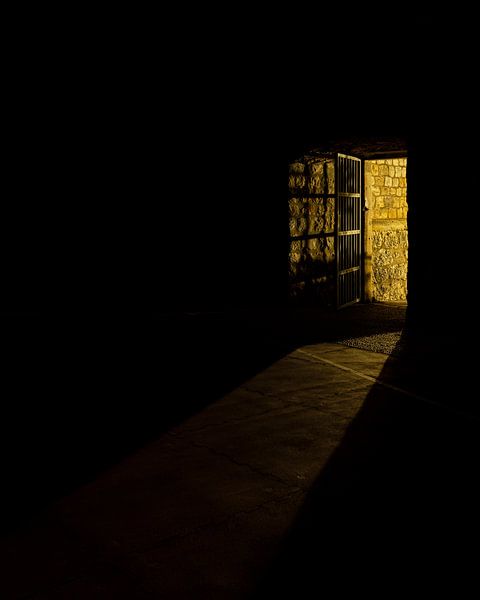 Light through door in Dubrovnik (Croatia) by Marcel Kerdijk