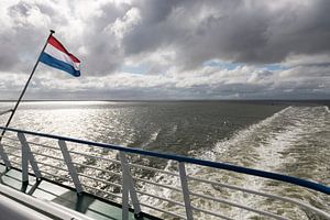 Waddenzee met Nederlandse vlag