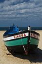 Old wooden boat on the beach of Nazare. Mimosa Nazare. by Iris Heuer thumbnail