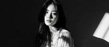 Black and white portrait of a woman in the light by Poster Art Shop