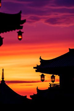 Zonsondergang over pagodes van Poster Art Shop