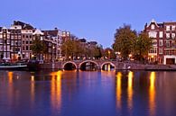 Amsterdam bij avond aan de Amstel in Nederland par Eye on You Aperçu