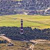 Lighthouse Ameland & village Hollum by Roel Ovinge