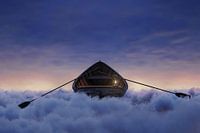 Abandoned boat over sea of clouds in the blue hour