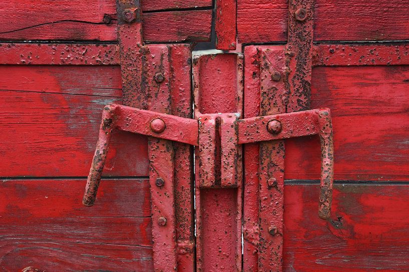 Detail of a colourful wooden cart by Retrotimes
