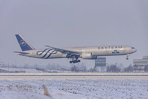 KLM Boeing 777-300 lands at wintry Schiphol. by Jaap van den Berg