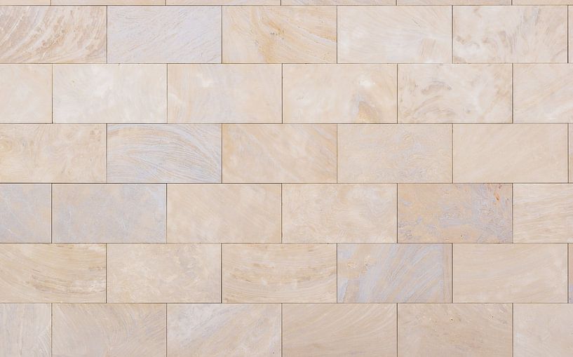 Structure d'un mur de pierres grises, gros plan par Alex Winter