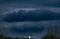Nature's Kiss: Cloud Lips in the Sky