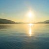 Lever du soleil sur le lac sur Markus Jerko