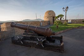 Cannon on bastion of Alghero, Sardinia, Italy by Joost Adriaanse