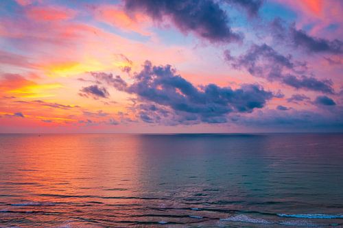 Sunrise on the beach by Mustafa Kurnaz