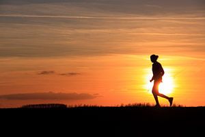 Hardlopen met zonsondergang