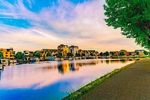 coucher de soleil sur le port sur Dennis Carette