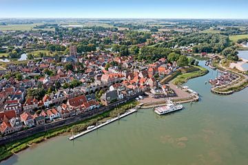 Aerial view of the town of Woudrichemon the river Merwede in the Netherlands by Eye on You