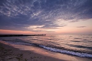 Sunset on shore of the Baltic Sea van Rico Ködder