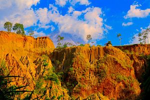 Vulcan Merapi behind steep hill in bright version