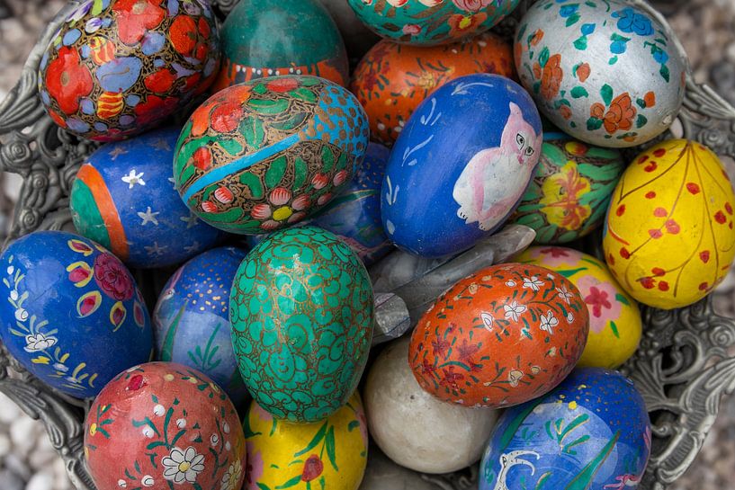 Colored eggs in silver basket by Sander Groenendijk