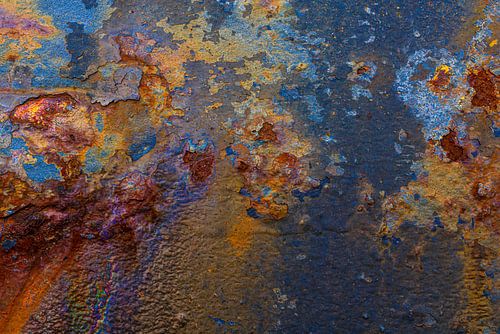 Rust in shades of blue, aqua, orange, purple and brown on the Wall by Alice Berkien-van Mil