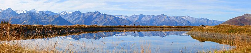 The Venediger group is reflected in the lake by Christa Kramer