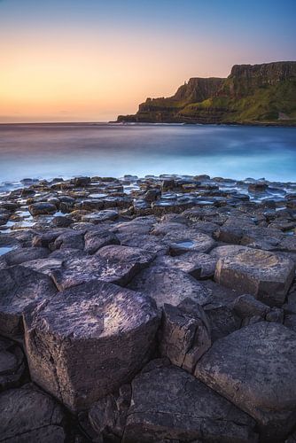 Ireland coast with basalt cliffs at sunset by Jean Claude Castor