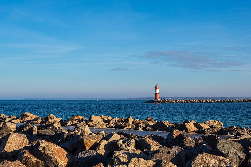 Pier and pier tower on the coast of the Baltic Sea in Warnemünde by Rico Ködder