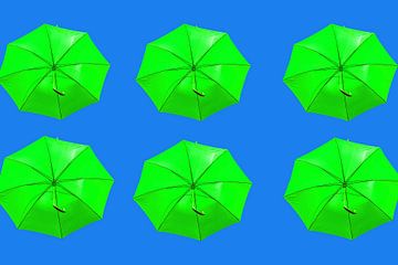 Green umbrella's on blue background by Patricia Hofmeester