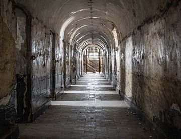 Corridor in abandoned prison by Roy Vereijken