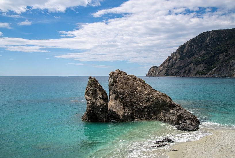 Evening by the sea... wild water splashes on the shore. by Maja Mars