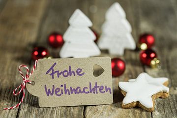 Etiket met handgeschreven groet in het duits, Frohe Weihnachten van Alex Winter