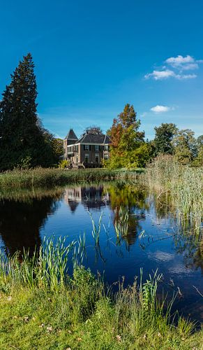 Standing panorama of Boekesteyn House with pond in 's-Graveland, Netherlands
