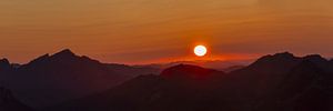 A sky of fire over the foothills of the Alps