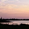 Silhouettes du coucher de soleil, soirée d'été au Lek près d'Ameide sur Maud De Vries