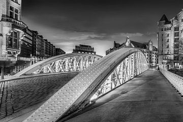 Hamburg warehouse district with old bridge. by Manfred Voss, Schwarz-weiss Fotografie